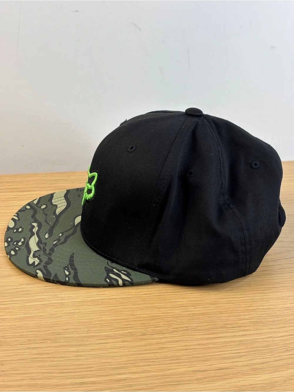 Fox Black Snapback Hat with Green Accent